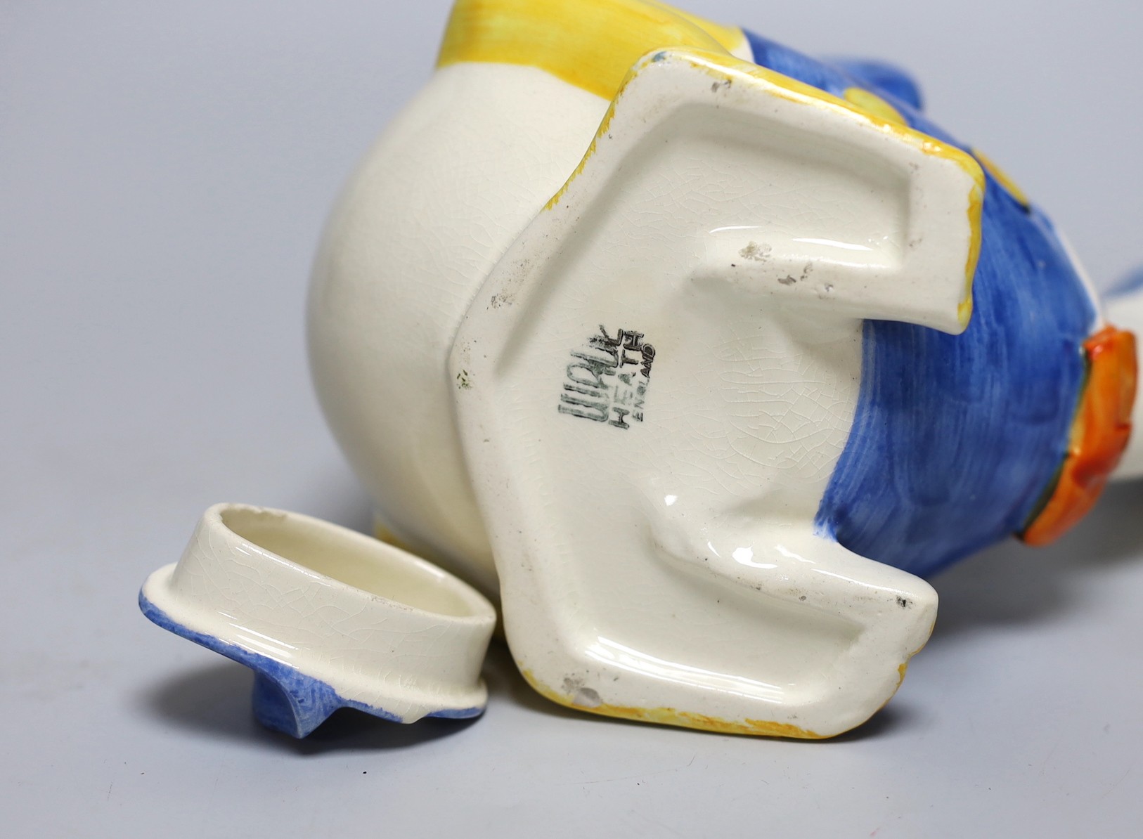 A Wade Heath Donald Duck teapot and cover, 22cms wide x 16.5cms high